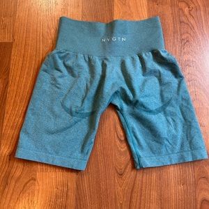 NVGTN TEAL CONTOUR BIKER SHORTS SIZE MEDIUM. Worn but in good condition